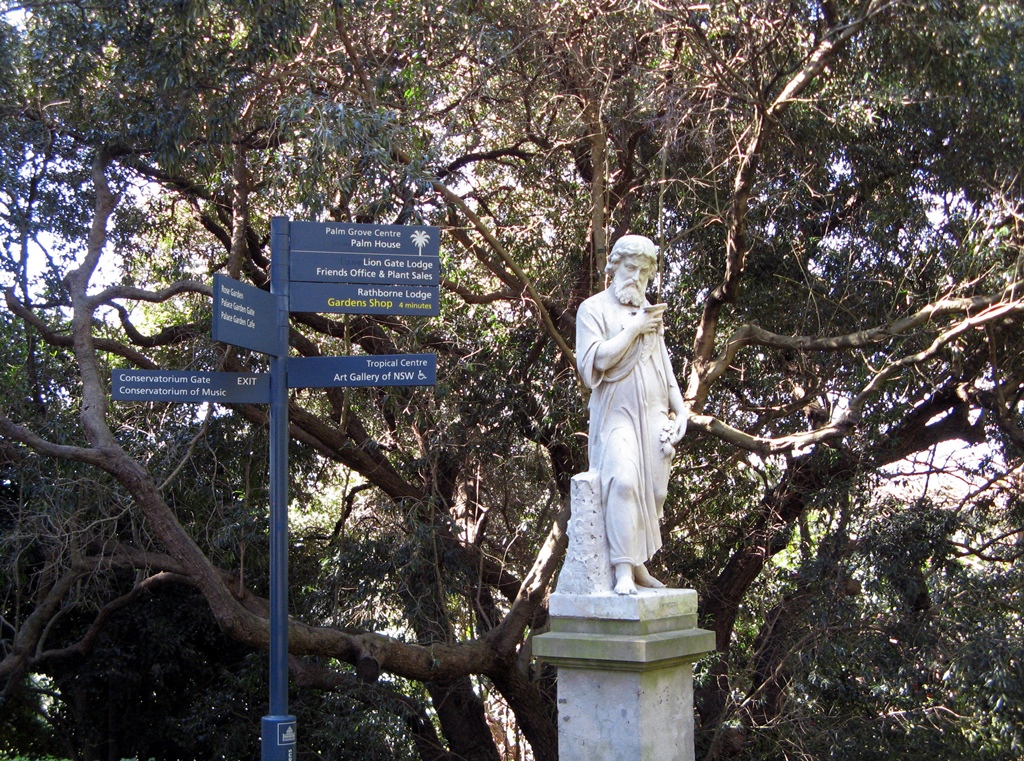 Statue and Signpost